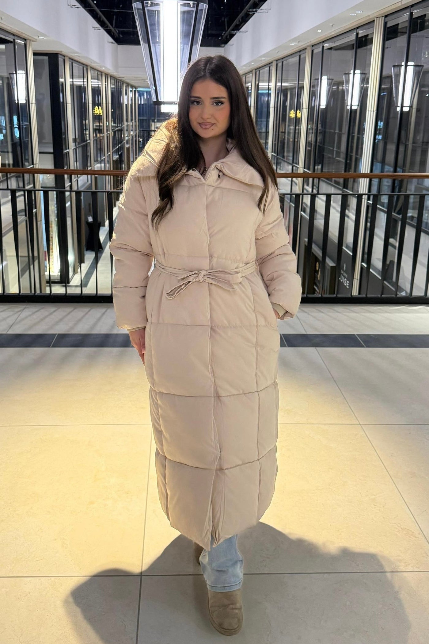 Langer gesteppter Mantel zum binden